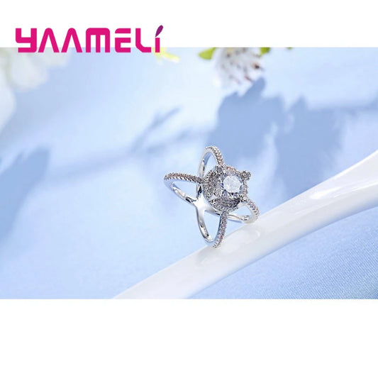 トレンド感のある女性用ウェディングアニロス卸売クロスフィンガーリング925スターリングシルバーカラーCZファッションクリスタルリング女性へのギフト