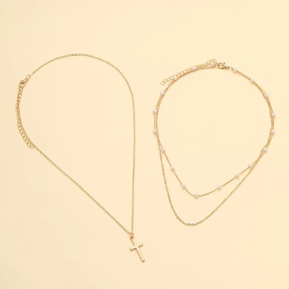 女性用クロスネックレス ゴールドメッキ マルチレイヤー スモールクロスペンダントチョーカー トレンディなチャームチェーンネックレス ジュエリー 宗教的なギフト