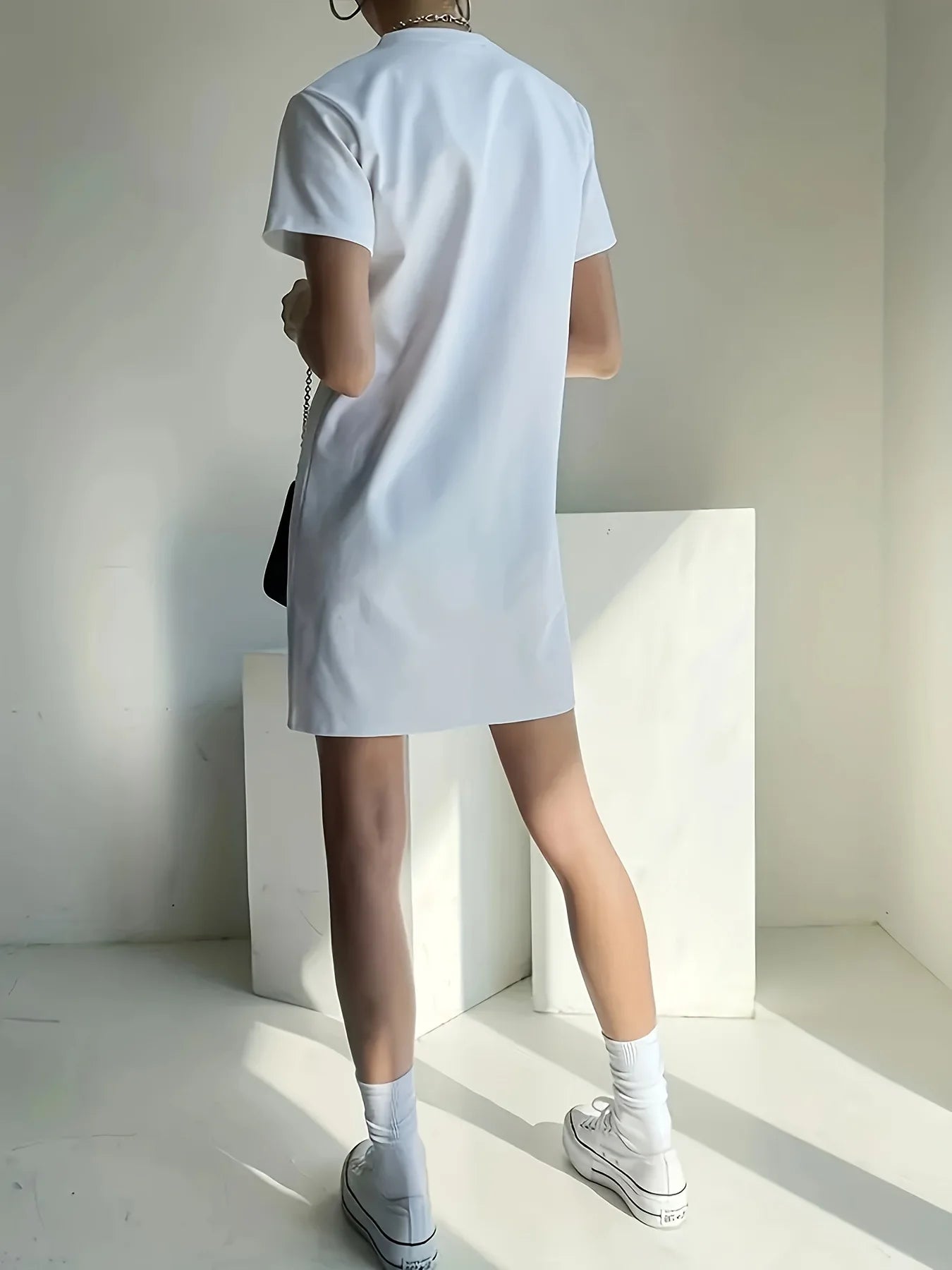 Women's fashionable small round neck simple solid color loose T-shirt dress 2025